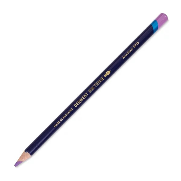 A single Amethyst Derwent Inktense Colour Pencil is shown diagonally across the center of the frame. The pencil is pointing with it's lead facing towards the bottom left hand corner. The barrel of the pencil is blue and the end of the pencil is colour dipped to match the colour of the lead for easy identification. There is text down the barrel of the pencil with the colour name and brand name. On a white background.