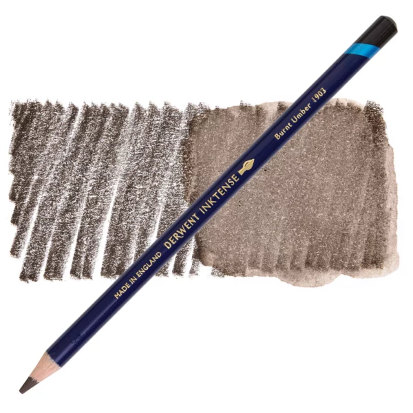 A single Burnt Umber Derwent Inktense Colour Pencil is shown diagonally across the center of the frame. The pencil is pointing with it's lead facing towards the bottom left hand corner. The barrel of the pencil is blue and the end of the pencil is colour dipped to match the colour of the lead for easy identification. There is text down the barrel of the pencil with the colour name and brand name. There is a colour swatch of the pencil in the background, that runs horizontally across the center of the frame. The image is center of the frame and on a white background.