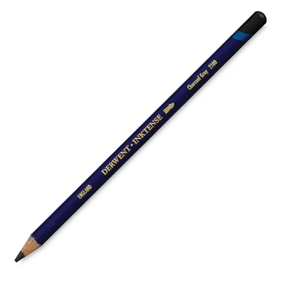 A single Charcoal Grey Derwent Inktense Colour Pencil is shown diagonally across the center of the frame. The pencil is pointing with it's lead facing towards the bottom left hand corner. The barrel of the pencil is blue and the end of the pencil is colour dipped to match the colour of the lead for easy identification. There is text down the barrel of the pencil with the colour name and brand name. On a white background.