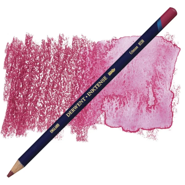 A single Crimson Derwent Inktense Colour Pencil is shown diagonally across the center of the frame. The pencil is pointing with it's lead facing towards the bottom left hand corner. The barrel of the pencil is blue and the end of the pencil is colour dipped to match the colour of the lead for easy identification. There is text down the barrel of the pencil with the colour name and brand name. There is a colour swatch of the pencil in the background, that runs horizontally across the center of the frame. The image is center of the frame and on a white background.