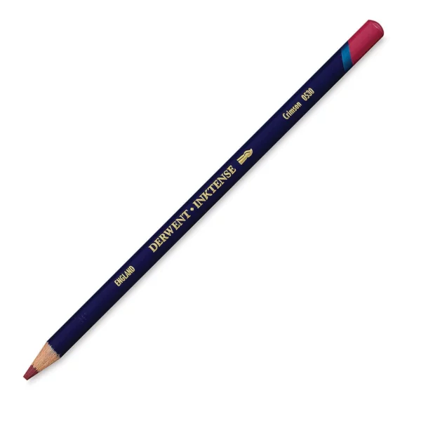 A single Crimson Derwent Inktense Colour Pencil is shown diagonally across the center of the frame. The pencil is pointing with it's lead facing towards the bottom left hand corner. The barrel of the pencil is blue and the end of the pencil is colour dipped to match the colour of the lead for easy identification. There is text down the barrel of the pencil with the colour name and brand name. On a white background.