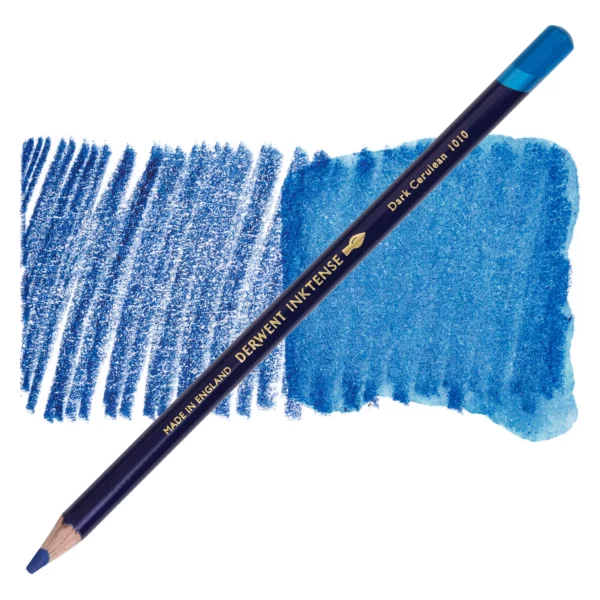 A single Dark Cerulean Derwent Inktense Colour Pencil is shown diagonally across the center of the frame. The pencil is pointing with it's lead facing towards the bottom left hand corner. The barrel of the pencil is blue and the end of the pencil is colour dipped to match the colour of the lead for easy identification. There is text down the barrel of the pencil with the colour name and brand name. There is a colour swatch of the pencil in the background, that runs horizontally across the center of the frame. The image is center of the frame and on a white background.