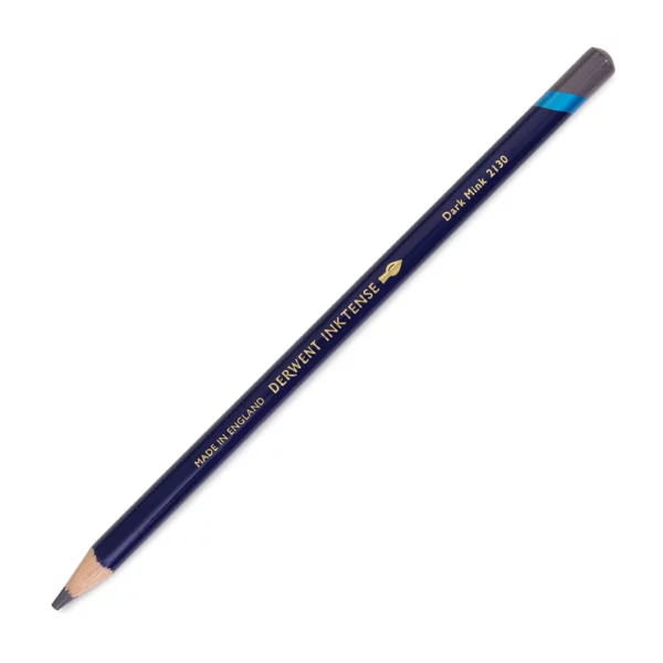 A single Ink Dark Mink Derwent Inktense Colour Pencil is shown diagonally across the center of the frame. The pencil is pointing with it's lead facing towards the bottom left hand corner. The barrel of the pencil is blue and the end of the pencil is colour dipped to match the colour of the lead for easy identification. There is text down the barrel of the pencil with the colour name and brand name. On a white background.