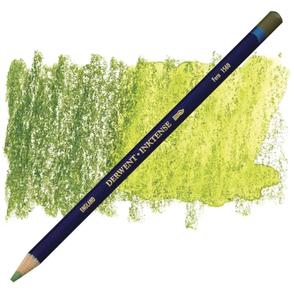 A single Fern Derwent Inktense Colour Pencil is shown diagonally across the center of the frame. The pencil is pointing with it's lead facing towards the bottom left hand corner. The barrel of the pencil is blue and the end of the pencil is colour dipped to match the colour of the lead for easy identification. There is text down the barrel of the pencil with the colour name and brand name. There is a colour swatch of the pencil in the background, that runs horizontally across the center of the frame. The image is center of the frame and on a white background.