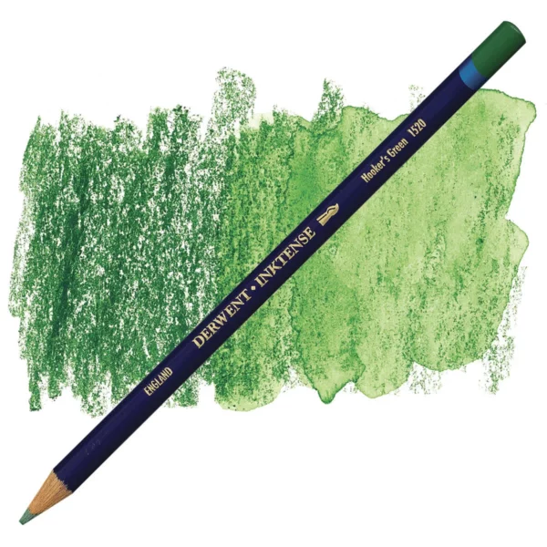 A single Hookers Green Derwent Inktense Colour Pencil is shown diagonally across the center of the frame. The pencil is pointing with it's lead facing towards the bottom left hand corner. The barrel of the pencil is blue and the end of the pencil is colour dipped to match the colour of the lead for easy identification. There is text down the barrel of the pencil with the colour name and brand name. There is a colour swatch of the pencil in the background, that runs horizontally across the center of the frame. The image is center of the frame and on a white background.