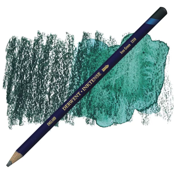 A single Iron Green Derwent Inktense Colour Pencil is shown diagonally across the center of the frame. The pencil is pointing with it's lead facing towards the bottom left hand corner. The barrel of the pencil is blue and the end of the pencil is colour dipped to match the colour of the lead for easy identification. There is text down the barrel of the pencil with the colour name and brand name. There is a colour swatch of the pencil in the background, that runs horizontally across the center of the frame. The image is center of the frame and on a white background.