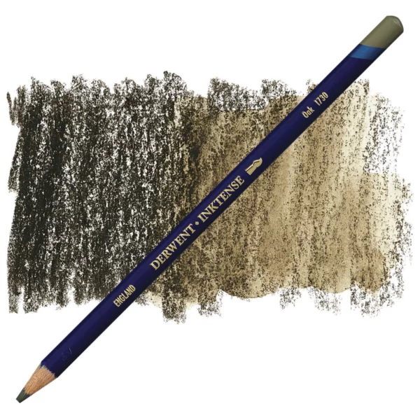 A single Oak Derwent Inktense Colour Pencil is shown diagonally across the center of the frame. The pencil is pointing with it's lead facing towards the bottom left hand corner. The barrel of the pencil is blue and the end of the pencil is colour dipped to match the colour of the lead for easy identification. There is text down the barrel of the pencil with the colour name and brand name. There is a colour swatch of the pencil in the background, that runs horizontally across the center of the frame. The image is center of the frame and on a white background.