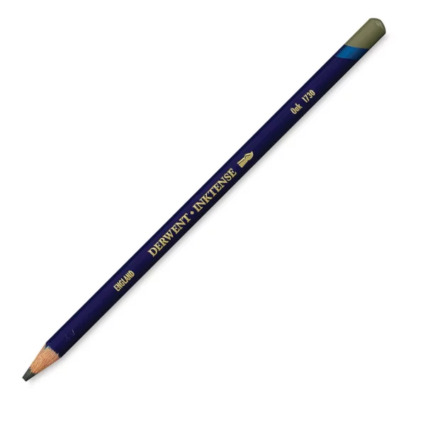 A single Oak Derwent Inktense Colour Pencil is shown diagonally across the center of the frame. The pencil is pointing with it's lead facing towards the bottom left hand corner. The barrel of the pencil is blue and the end of the pencil is colour dipped to match the colour of the lead for easy identification. There is text down the barrel of the pencil with the colour name and brand name. On a white background.