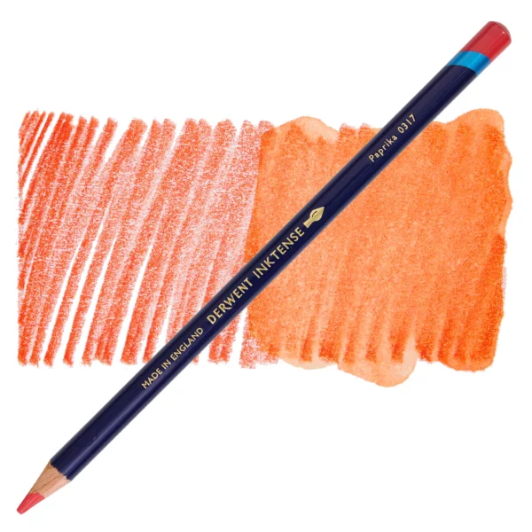 A single Paprika Derwent Inktense Colour Pencil is shown diagonally across the center of the frame. The pencil is pointing with it's lead facing towards the bottom left hand corner. The barrel of the pencil is blue and the end of the pencil is colour dipped to match the colour of the lead for easy identification. There is text down the barrel of the pencil with the colour name and brand name. There is a colour swatch of the pencil in the background, that runs horizontally across the center of the frame. The image is center of the frame and on a white background.