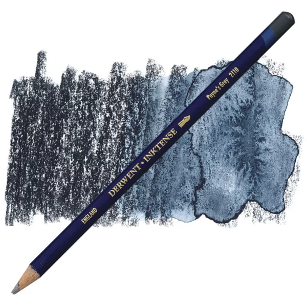 A single Paynes Grey Derwent Inktense Colour Pencil is shown diagonally across the center of the frame. The pencil is pointing with it's lead facing towards the bottom left hand corner. The barrel of the pencil is blue and the end of the pencil is colour dipped to match the colour of the lead for easy identification. There is text down the barrel of the pencil with the colour name and brand name. There is a colour swatch of the pencil in the background, that runs horizontally across the center of the frame. The image is center of the frame and on a white background.