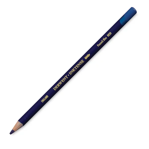 A single Peacock Blue Derwent Inktense Colour Pencil is shown diagonally across the center of the frame. The pencil is pointing with it's lead facing towards the bottom left hand corner. The barrel of the pencil is blue and the end of the pencil is colour dipped to match the colour of the lead for easy identification. There is text down the barrel of the pencil with the colour name and brand name. On a white background.