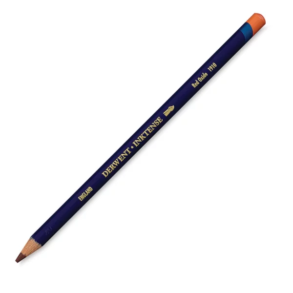 A single Red Oxide Derwent Inktense Colour Pencil is shown diagonally across the center of the frame. The pencil is pointing with it's lead facing towards the bottom left hand corner. The barrel of the pencil is blue and the end of the pencil is colour dipped to match the colour of the lead for easy identification. There is text down the barrel of the pencil with the colour name and brand name. On a white background.