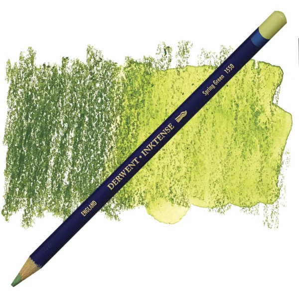 A single Spring Green Derwent Inktense Colour Pencil is shown diagonally across the center of the frame. The pencil is pointing with it's lead facing towards the bottom left hand corner. The barrel of the pencil is blue and the end of the pencil is colour dipped to match the colour of the lead for easy identification. There is text down the barrel of the pencil with the colour name and brand name. There is a colour swatch of the pencil in the background, that runs horizontally across the center of the frame. The image is center of the frame and on a white background.