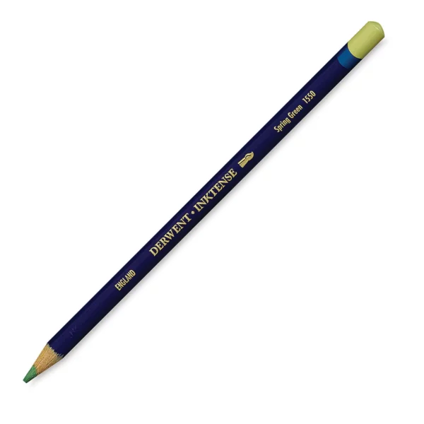 A single Spring Green Derwent Inktense Colour Pencil is shown diagonally across the center of the frame. The pencil is pointing with it's lead facing towards the bottom left hand corner. The barrel of the pencil is blue and the end of the pencil is colour dipped to match the colour of the lead for easy identification. There is text down the barrel of the pencil with the colour name and brand name. On a white background.