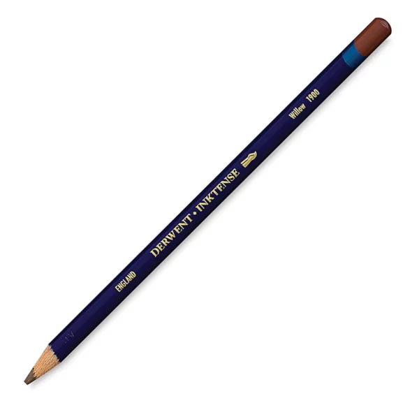 A single Willow Derwent Inktense Colour Pencil is shown diagonally across the center of the frame. The pencil is pointing with it's lead facing towards the bottom left hand corner. The barrel of the pencil is blue and the end of the pencil is colour dipped to match the colour of the lead for easy identification. There is text down the barrel of the pencil with the colour name and brand name. On a white background.