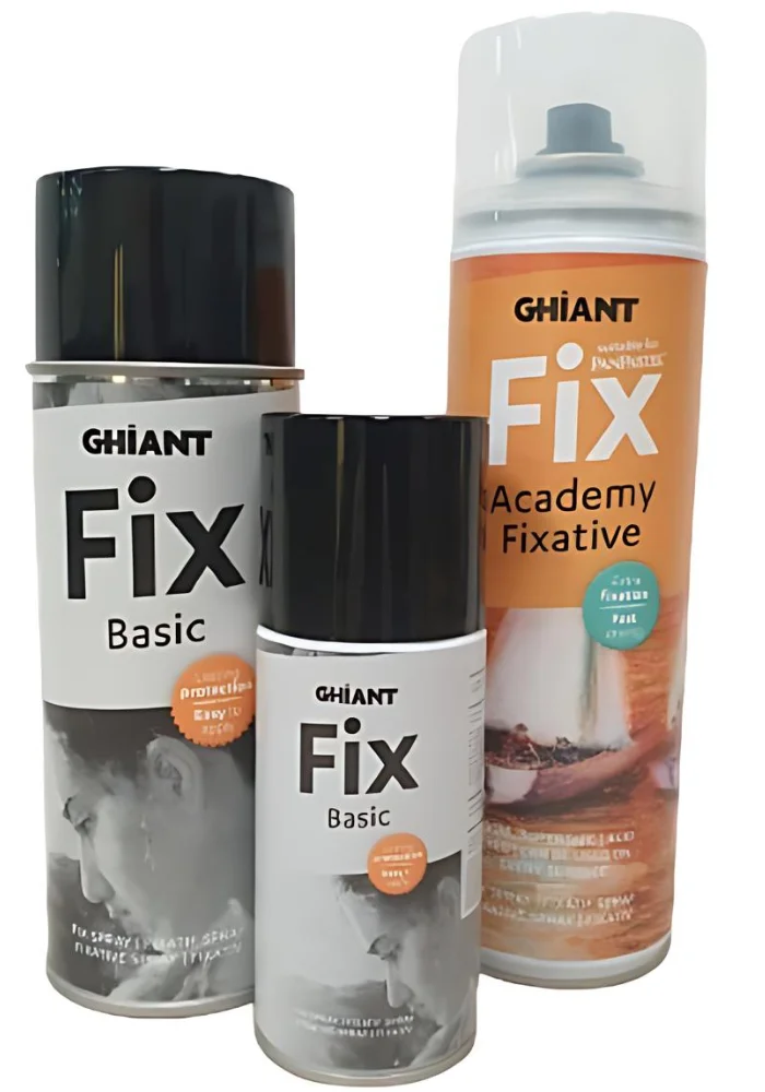 three bottles of ghiant fixative spray in different sizes are placed next to eachother int he center of the image. the big orange 500ml bottle is on the left, the smaller bottle is on the right and the small 150ml bottle is in the middle at the front. the two smaller bottles have grey labels and black lids and the orange bottle has a white lid. in the center of the image on a white background