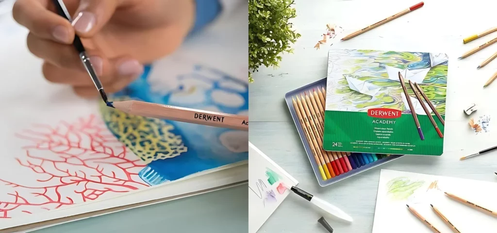 on the left of the image is Set of 24 Derwent Academy Watercolour Pencils in use with paint brush and on the right of the image is Set of 24 Derwent Academy Watercolour Pencils Displayed on desk with open tin