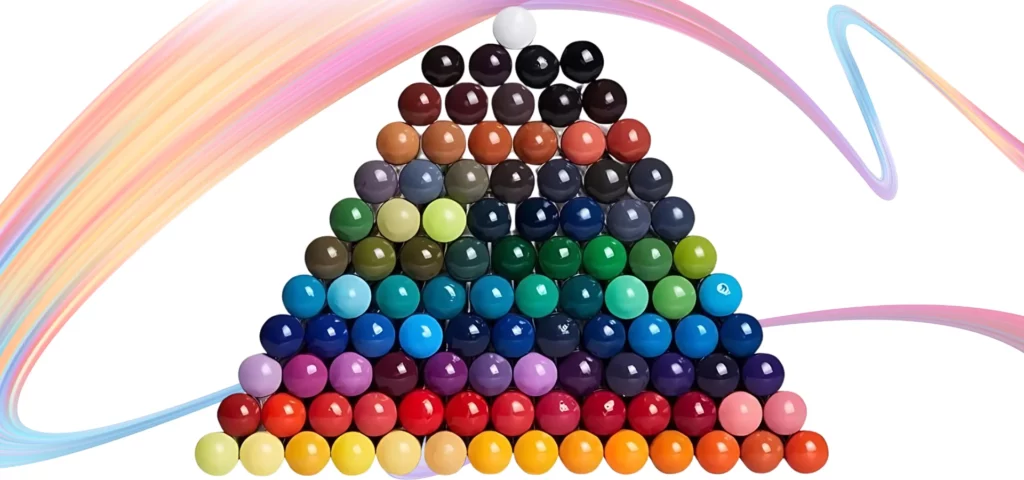 There is a pile of loose pencils from the Set of 100 Derwent Inktense Pencils shown in the center of the frame. Only the back, dipped end of the pencils can be seen in a pyramid formation. There are 100 pencils. Each dipped end shows the different colour of the pencil lead. There are 3 circles in the top right hand corner of the frame that indicate the pencils are water reactive, their lead size of 4mm and the number of colours in the range. infront of a rainbow squiggle On a white background.