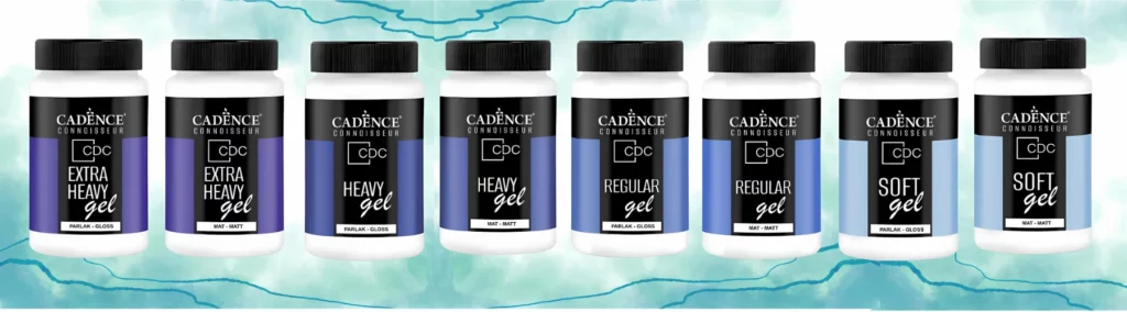 the cadence connoisseur gels are lined up in a row, they are all different textures and matt and gloss variations. they are white tubs with blue labels and black lids. they are on a watercolour effect background of blue with dark blue veins running through it.