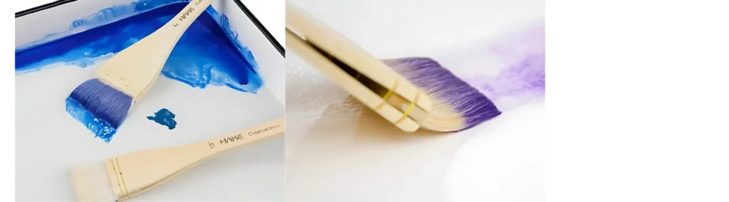 the left hand side image is two hake brushes in a paint tray that is white. in the top corner of the tray is a watercolour paint of blue that the one brush has been dipped into. the right hand image is a close up of a small hake brush with purple watercolour paint on it being used to wash the colour on watercolour paper