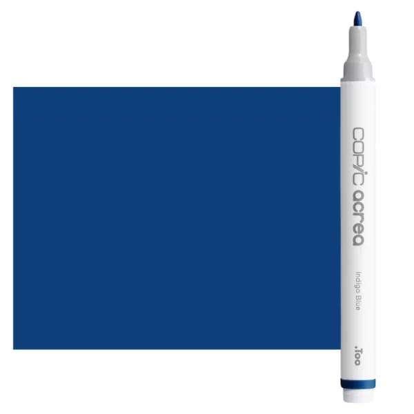 A single Indigo Blue Copic Acrea Paint Marker is shown standing vertically along the right hand side of the frame. The marker does not have a lid on, so you can see the round bullet tip. The marker is white with a colour band around the bottom of the marker barrel that denotes the colour of the ink. The Copic Acrea logo and colour name are printed on the barrel of the marker. There is a large, rectangular colour block to the left of the marker, and just underneath the marker that is filled with the colour of the ink. The image is center of the frame and on a white background.