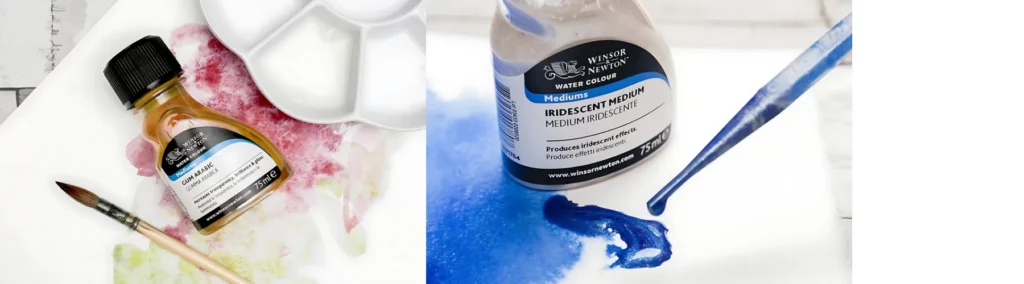 the left hand image is of a paintbrush next to a medium and a palette on a paper that has red paint on it. they are all facing upwards. the bottle is clear with a black lid and a black label with a blue stripe on it. the image on the right is of the medium and the paint infront of it being mixed with it to make is shine and glitter with a pippette.onto watercolour paper