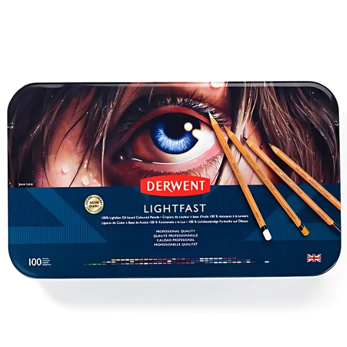 Set of 100 Derwent Lightfast Pencils is in the center of the image in its original tin. the tin is blue with an image of an eye with pencils next to it.